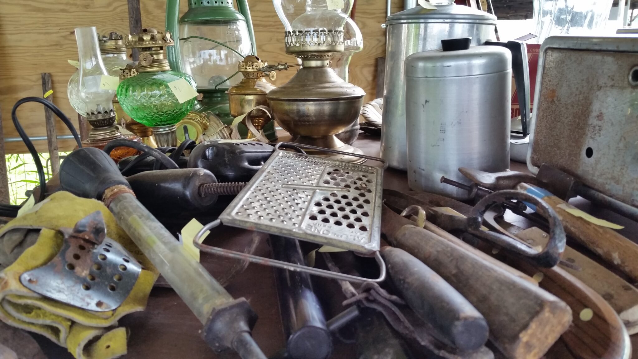 Rusty Tools and Oil Lamps at the Flea Market